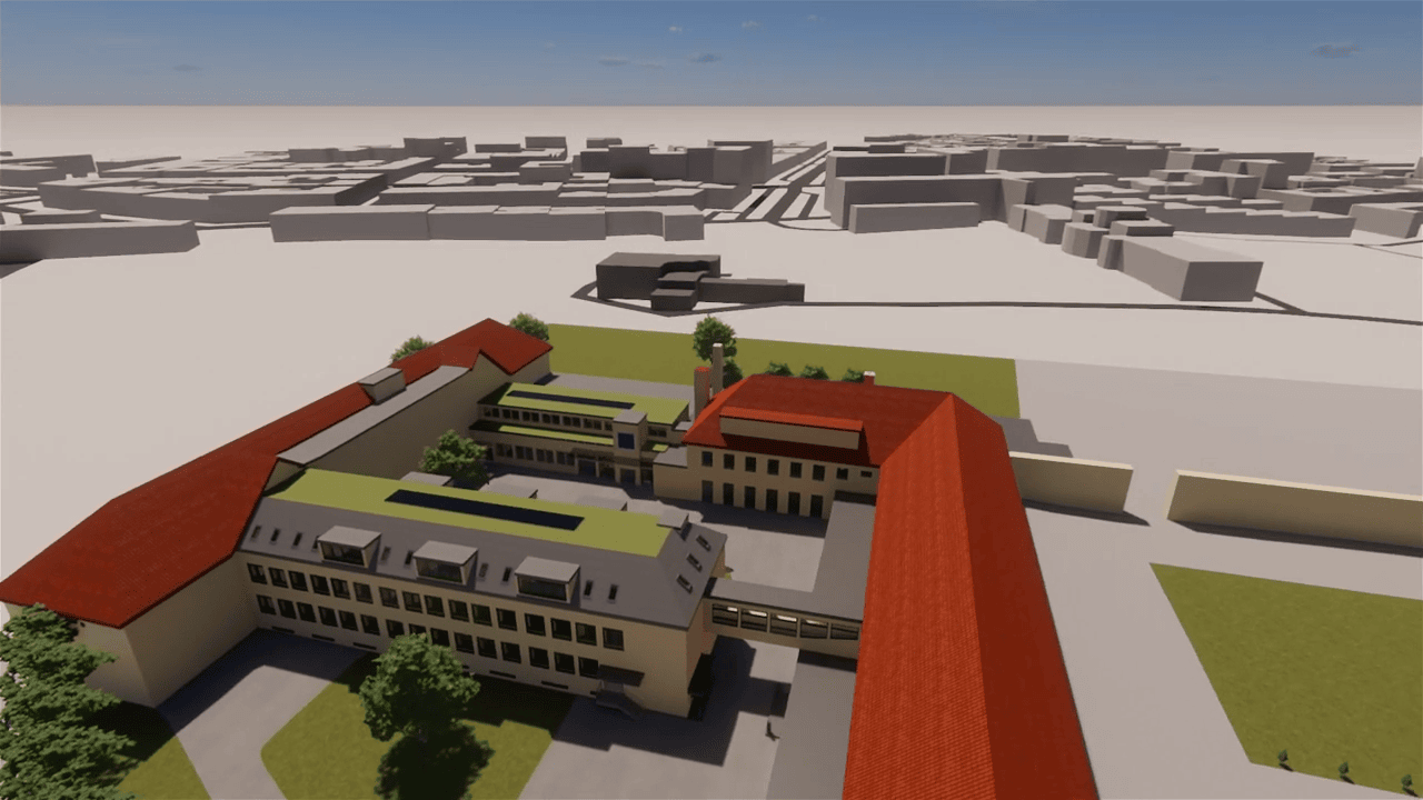 3D-Visualisierung einer geplanten Gebäudestruktur mit roten Satteldächern, begrünten Flachdächern und einem zentralen Innenhof.